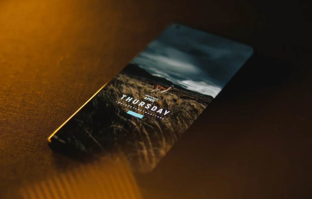 services-01 Close-up of a smartphone with ChatGPT interface on a speckled surface, highlighting technology and AI.